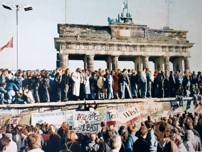 Germans on top of the Berlin Wall Nov 9, 1989