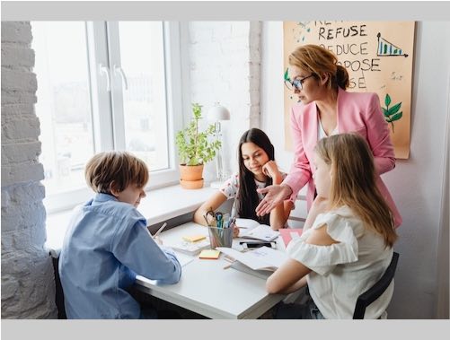 Family studying at kitchen table